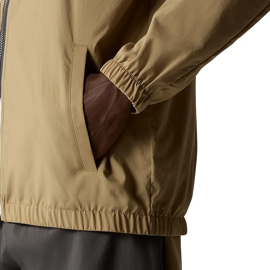 The North Face men's hooded windbreaker Track NF0A87J2WQO sand-anthracite